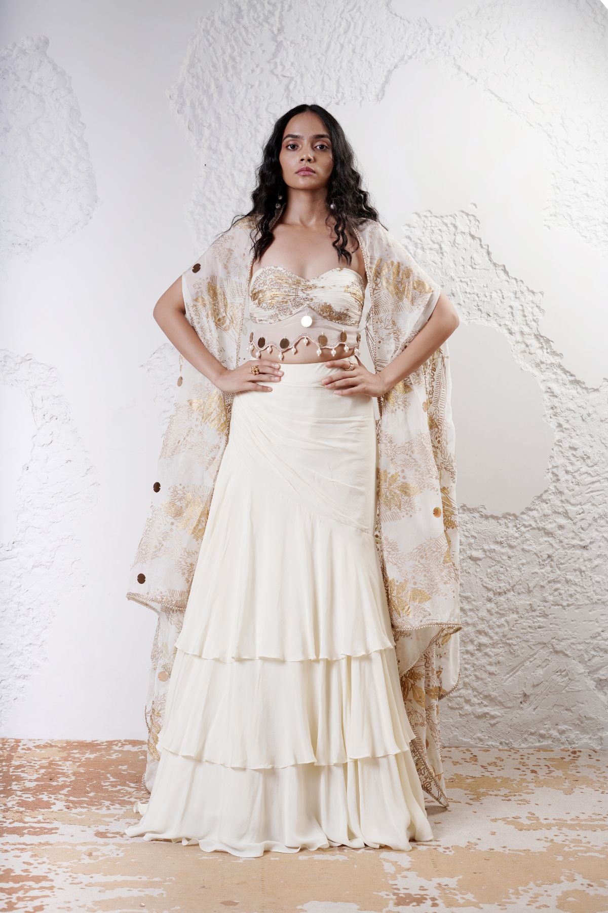 Layered Lehenga with Foil Ruvhed Bustier and Foil Cape