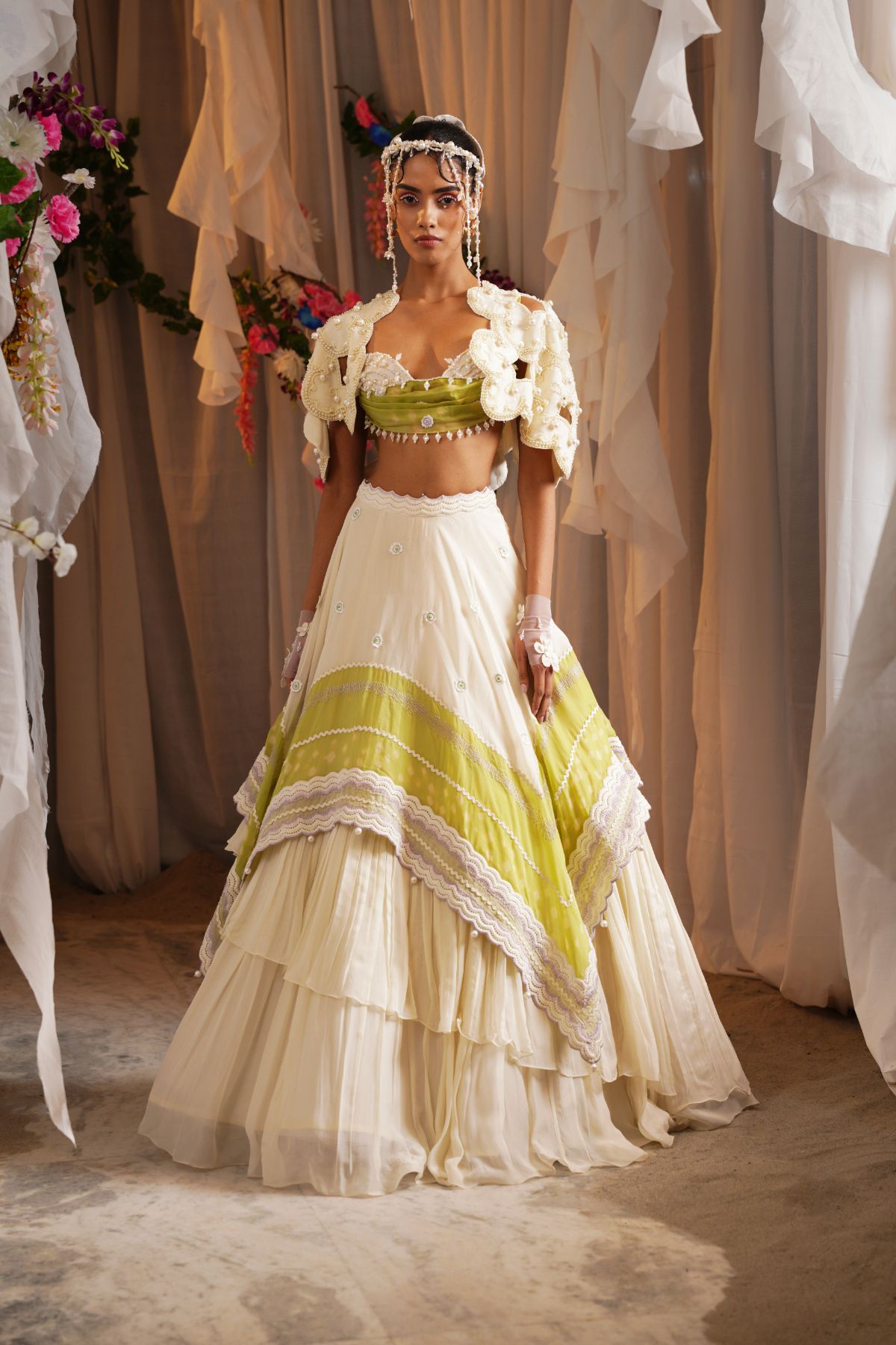 Scalloped Scarf Tier Lehenga With Draped Bustier And Floret Cutwork Cape