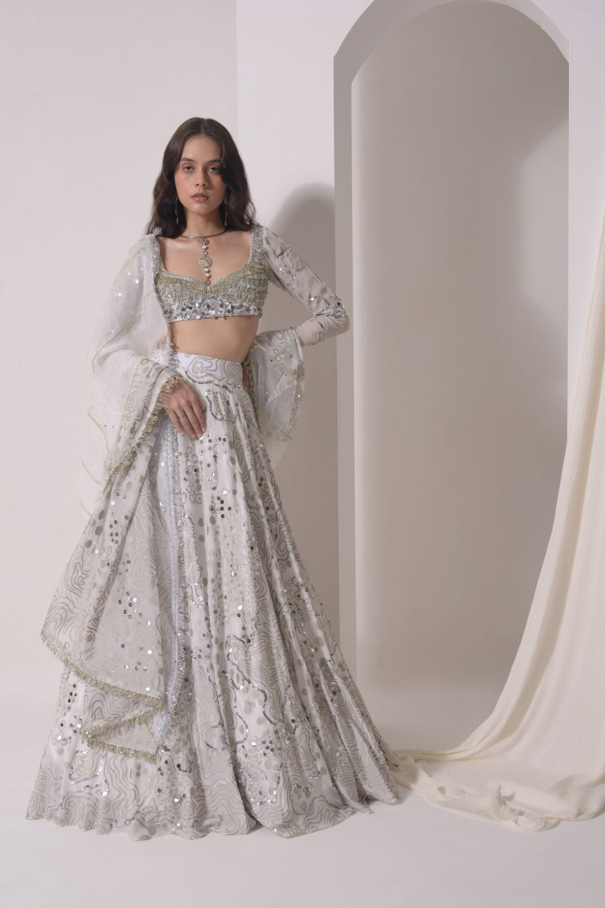 Foil twinkling lehenga with embroidered blouse and dupatta