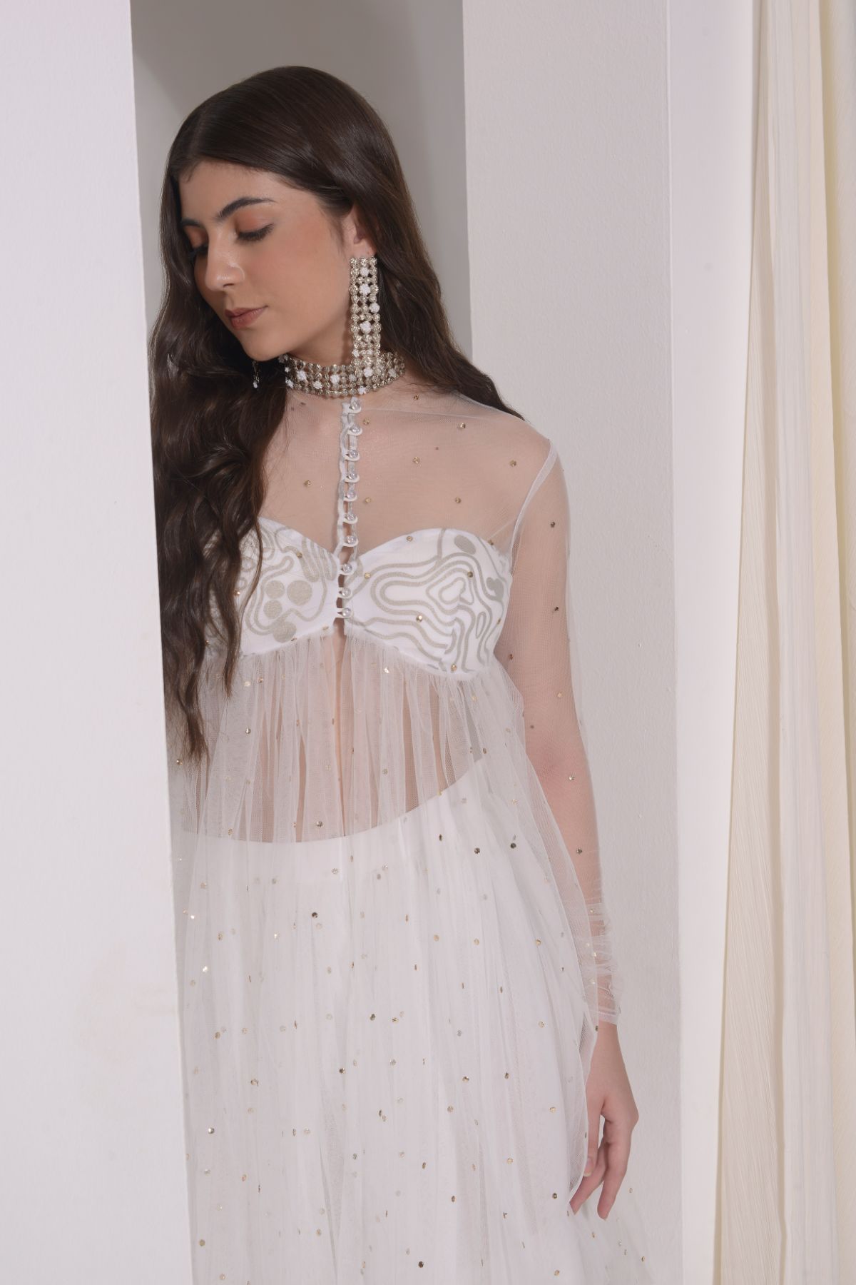 Asymmetrical ruched foil tunic with patchwork pants