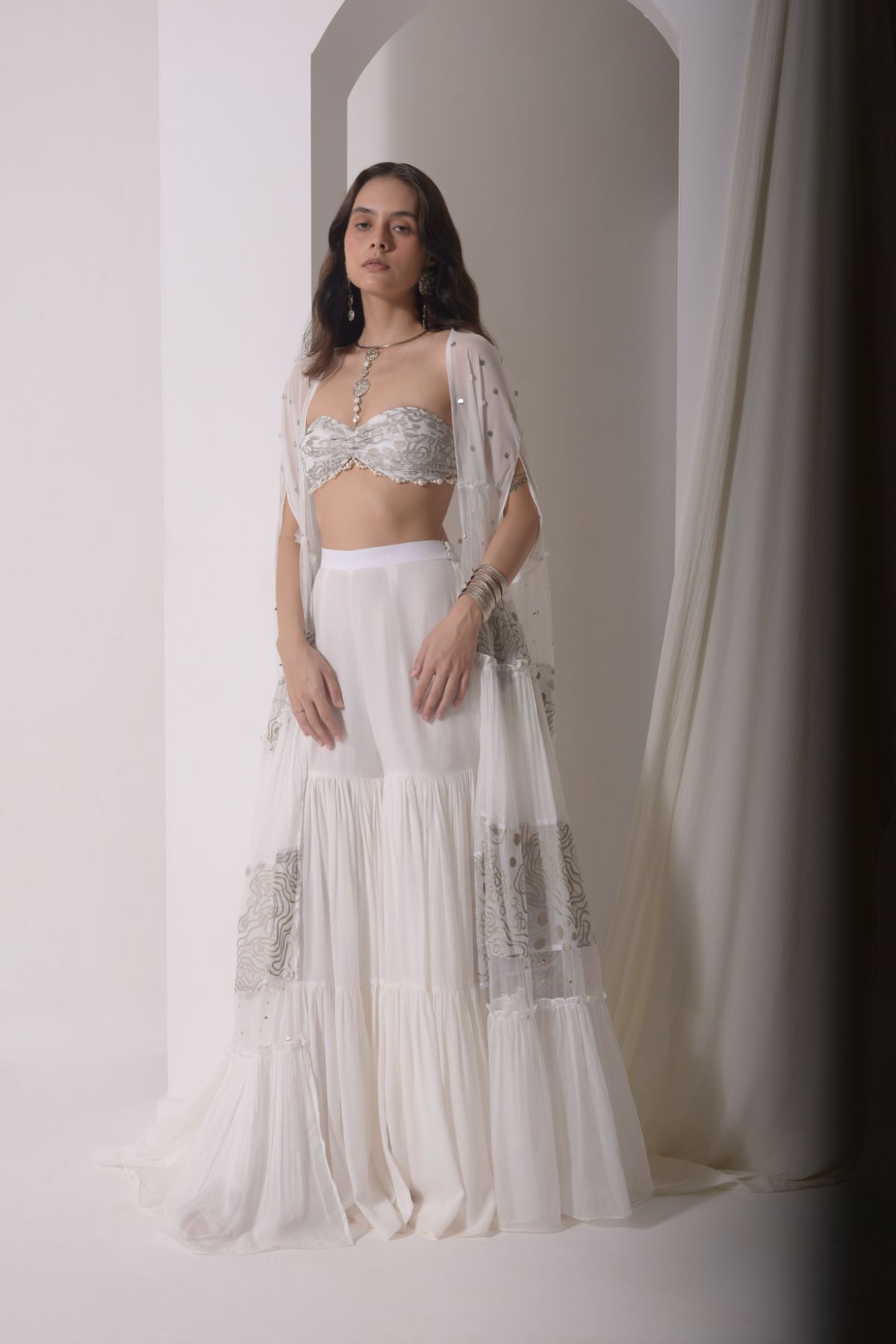 Ruched layered jacket with beaded foil bustier and sharara