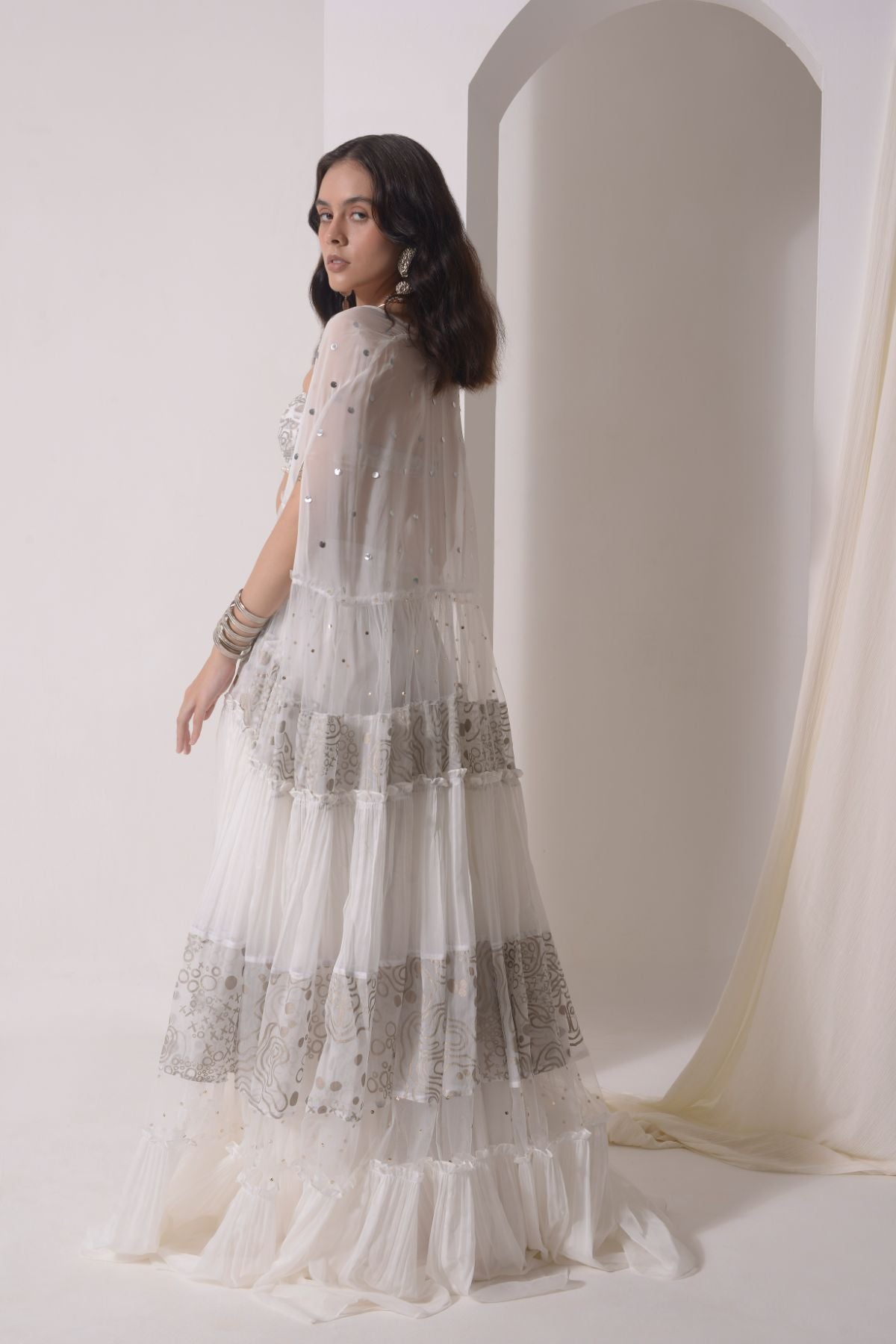 Ruched layered jacket with beaded foil bustier and sharara