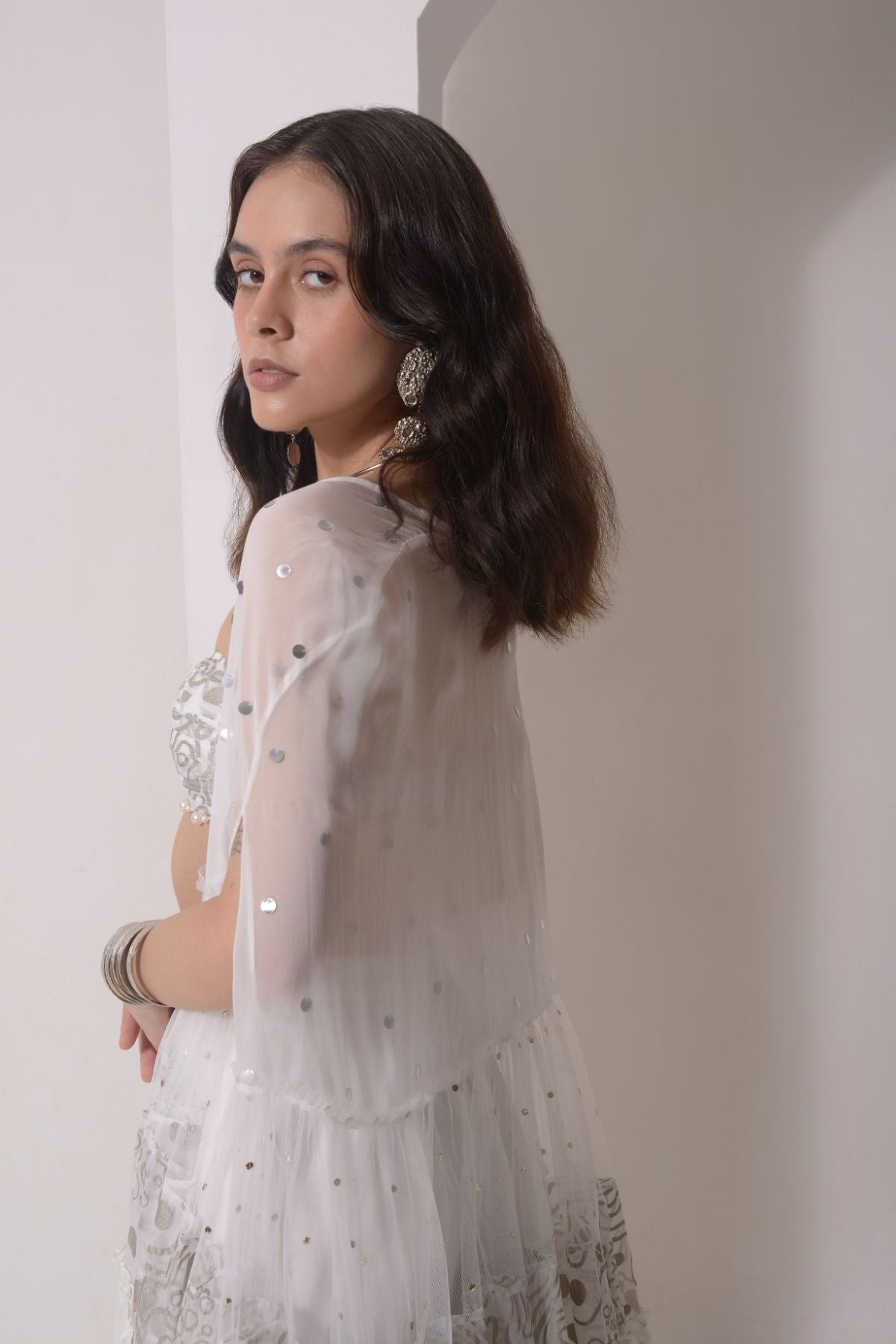 Ruched layered jacket with beaded foil bustier and sharara