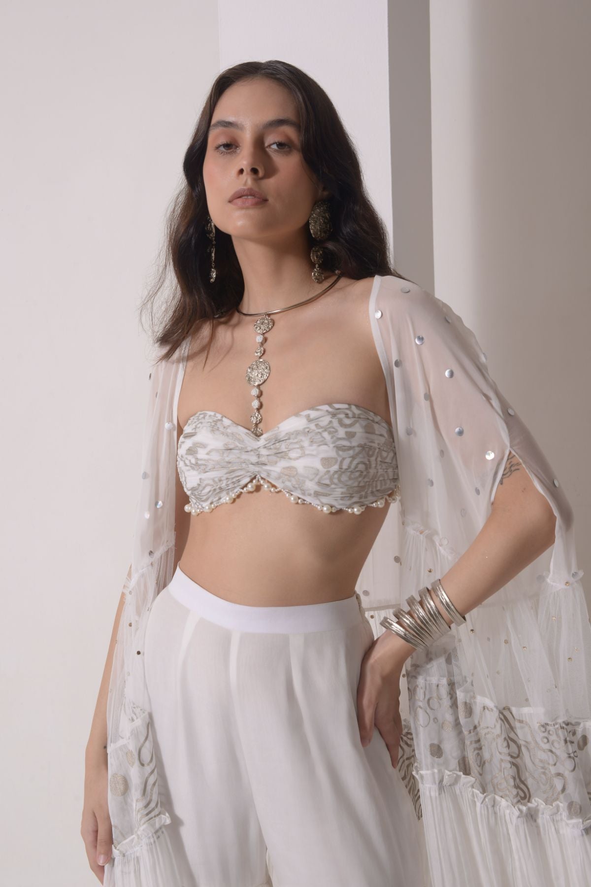 Ruched layered jacket with beaded foil bustier and sharara