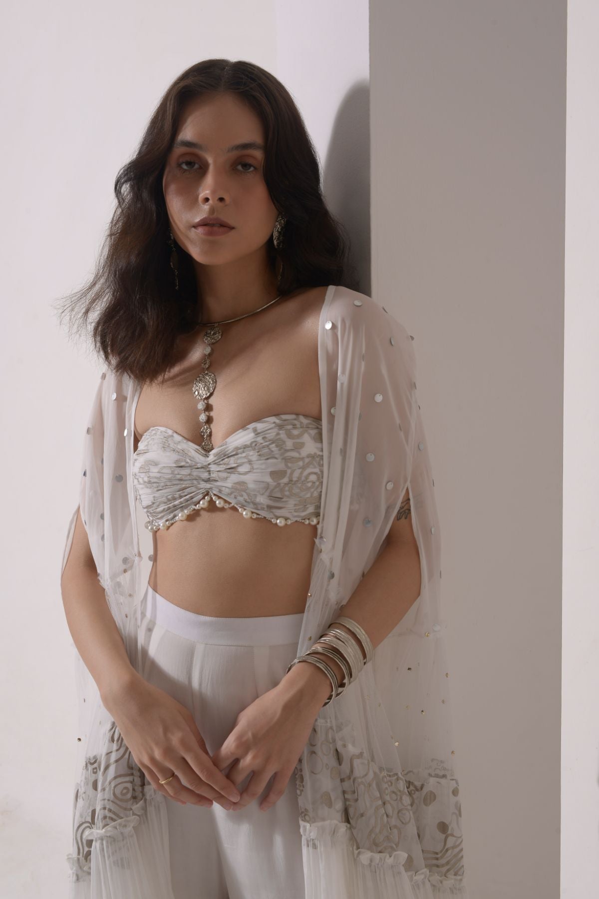 Ruched layered jacket with beaded foil bustier and sharara