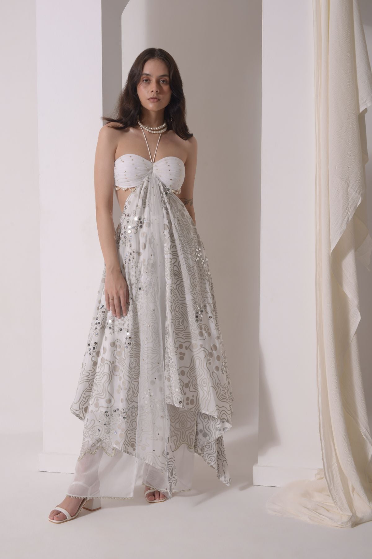 Asymmetrical ruched foil tunic with patchwork pants