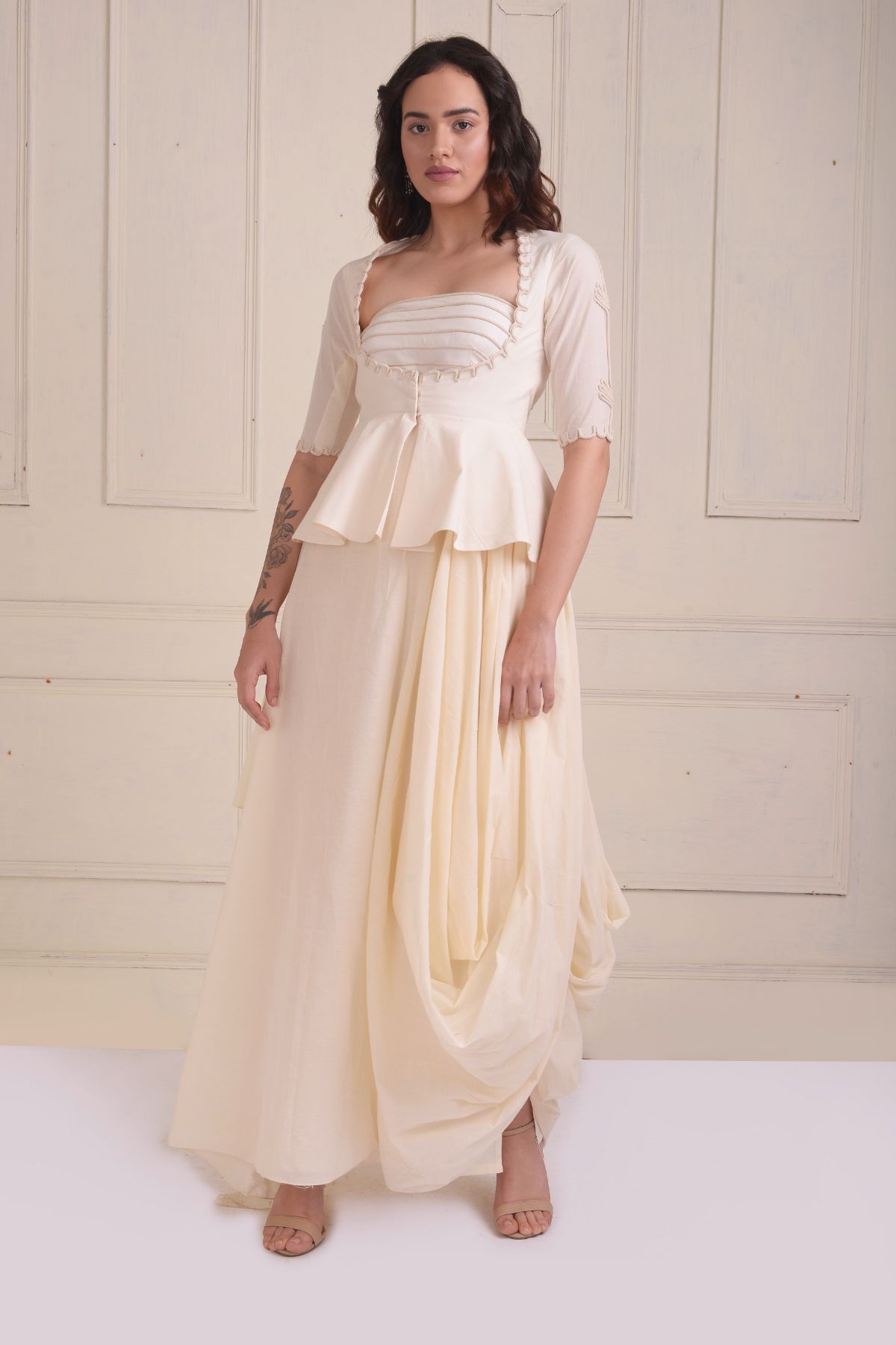 Dori embroidered peplum jacket with a gown