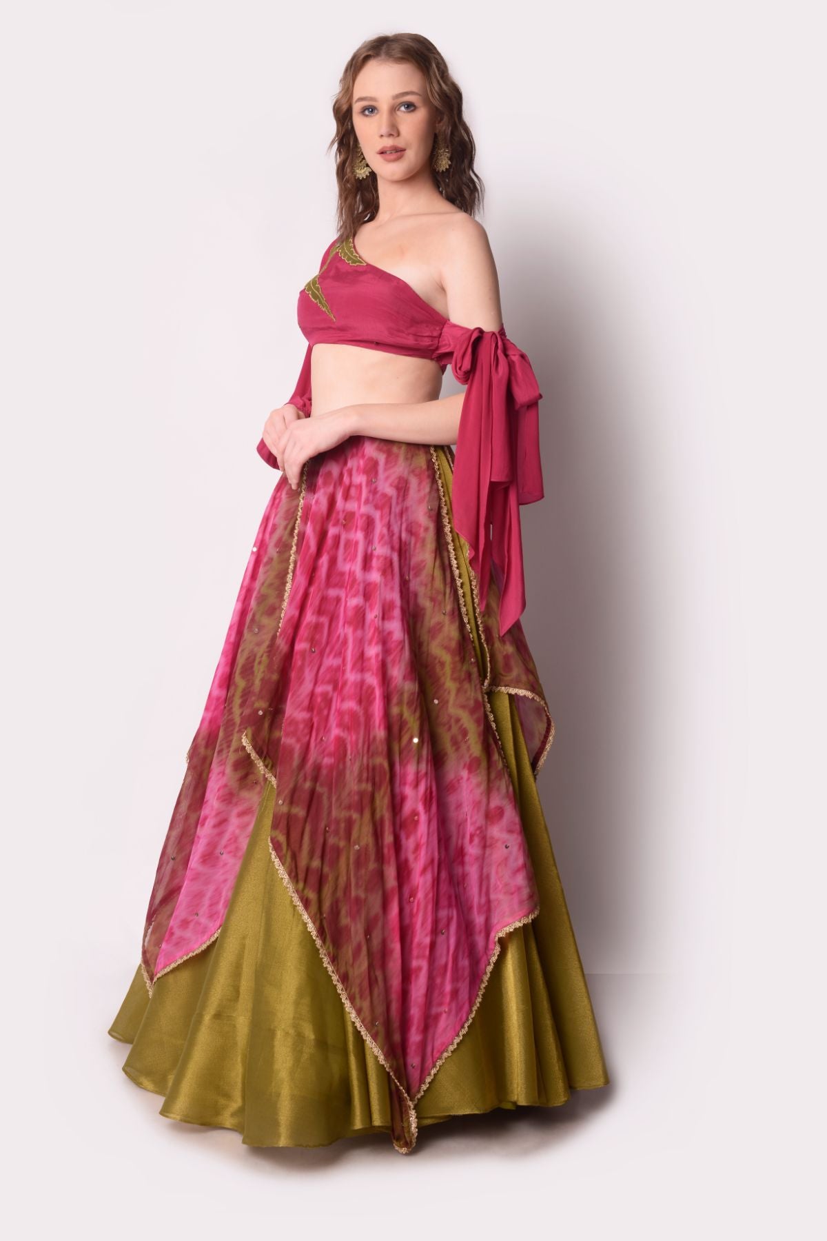 Tie –dye Layered Lehenga Paired With One Shoulder Tie Up Blouse