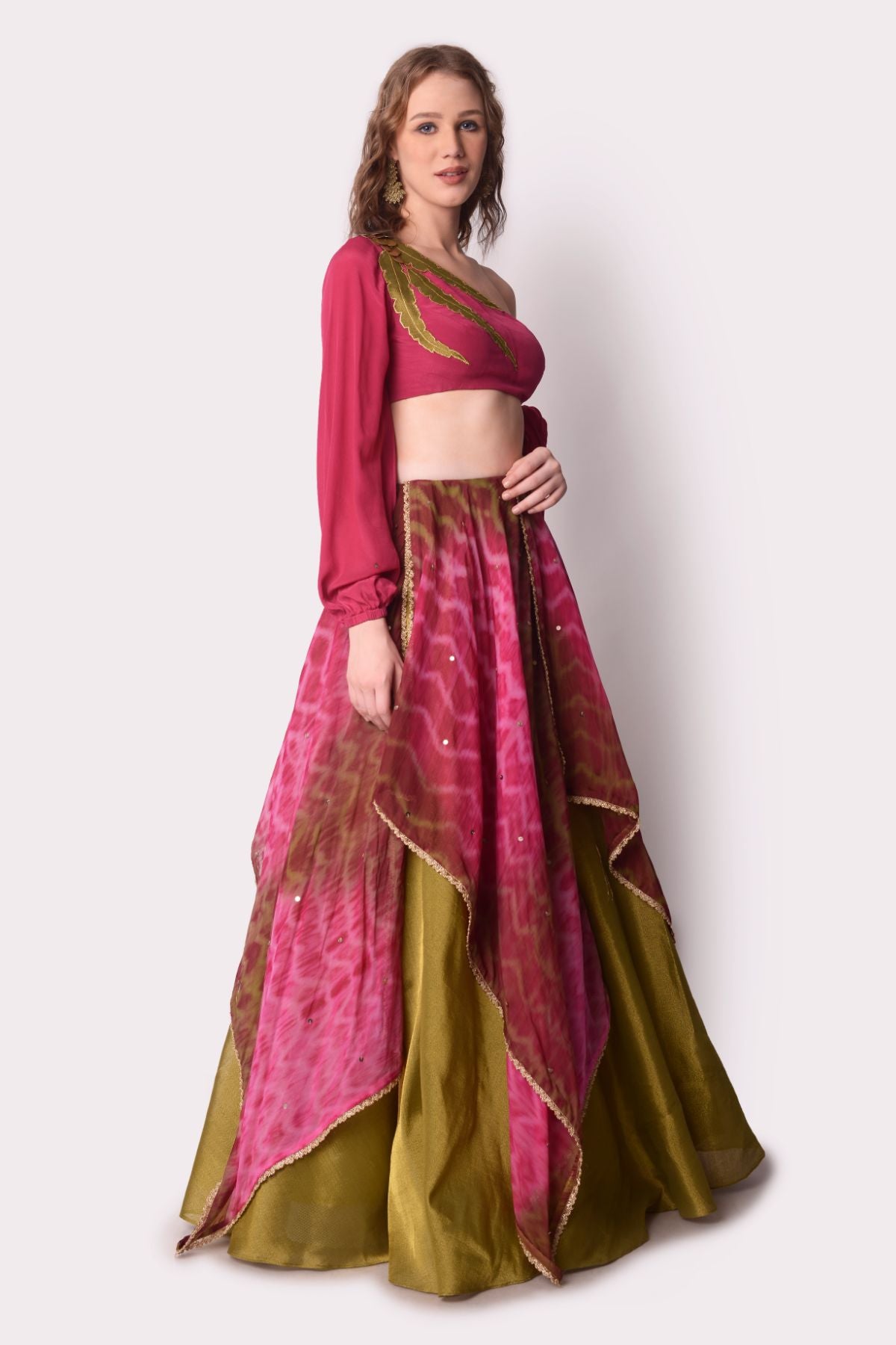 Tie –dye Layered Lehenga Paired With One Shoulder Tie Up Blouse