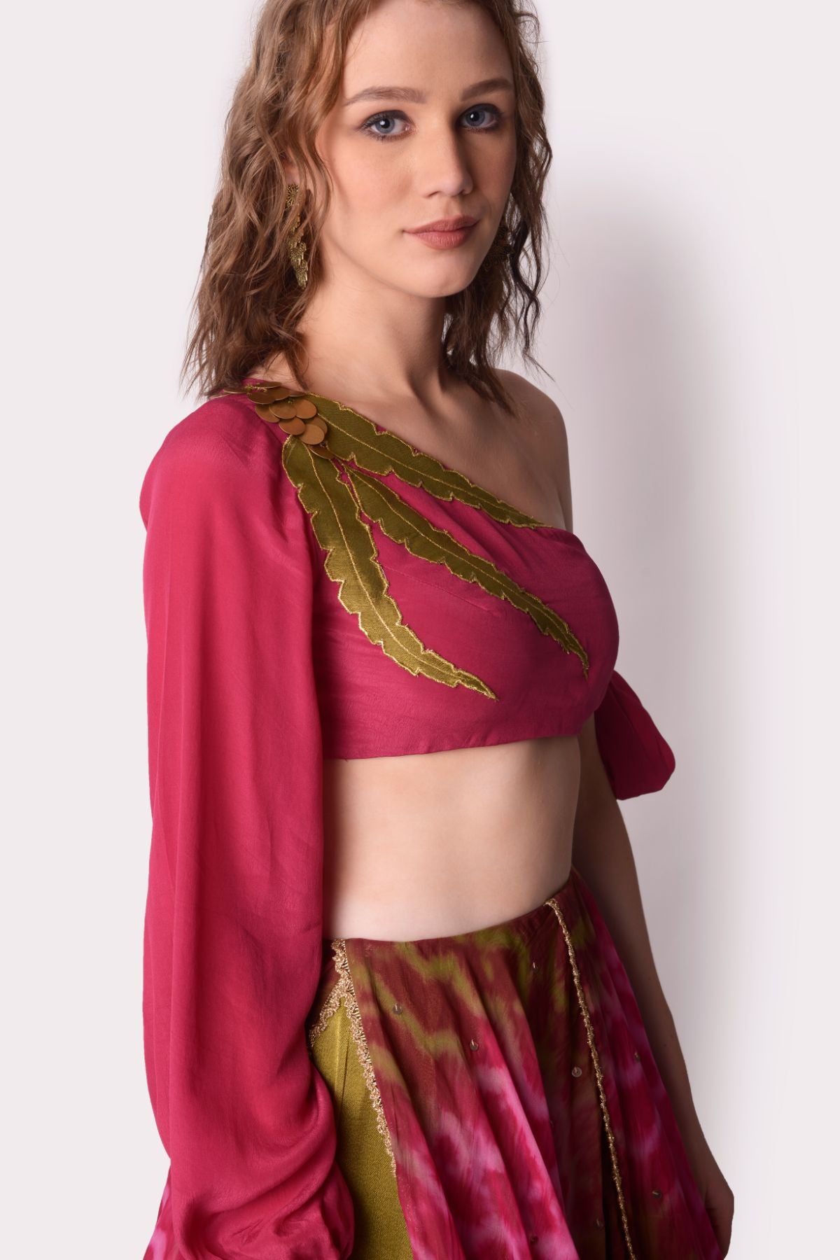 Tie –dye Layered Lehenga Paired With One Shoulder Tie Up Blouse