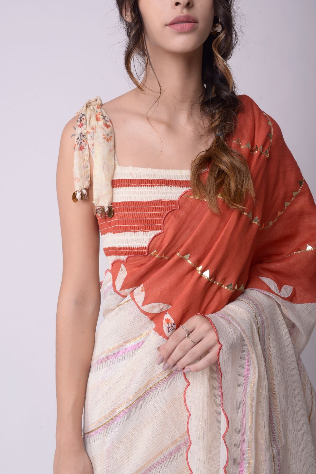 Appliqué Printed Godet Saree With Patchwork Smocking Crop Top.