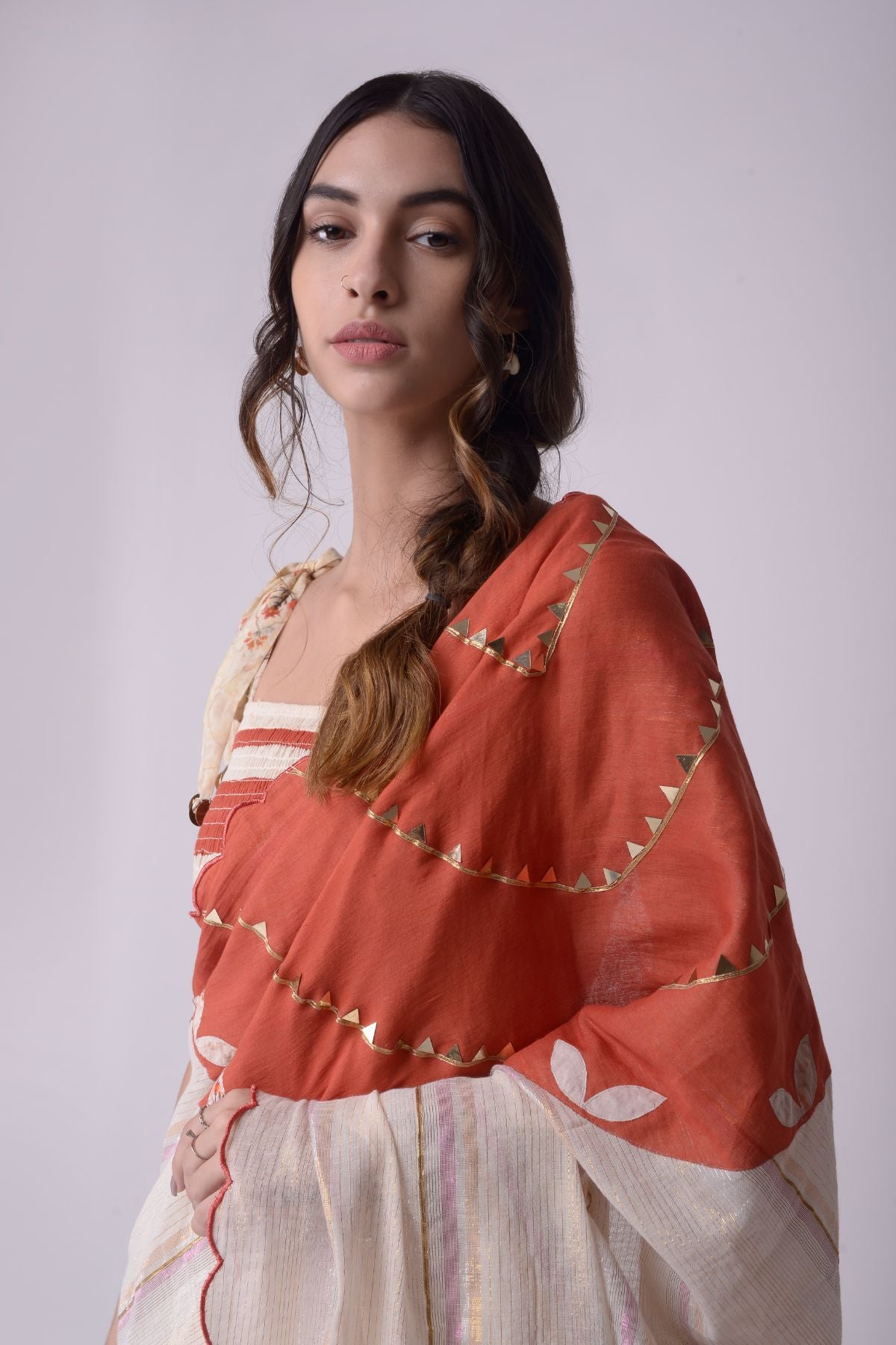 Appliqué Printed Godet Saree With Patchwork Smocking Crop Top.