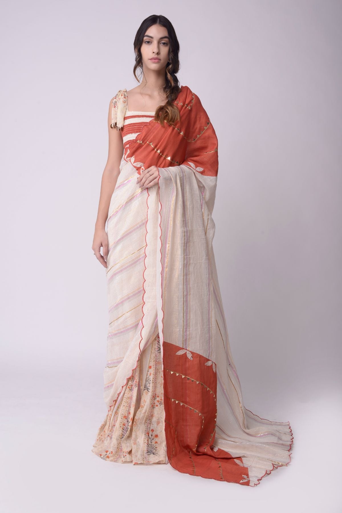 Appliqué Printed Godet Saree With Patchwork Smocking Crop Top.