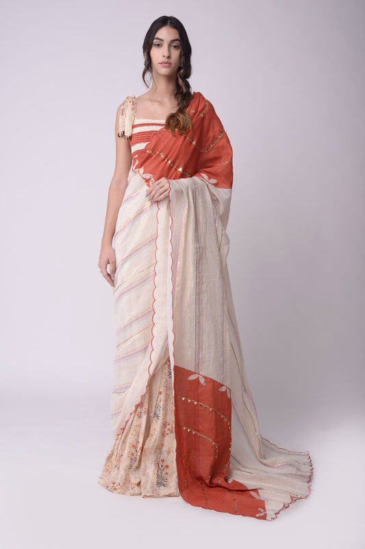 Appliqué Printed Godet Saree With Patchwork Smocking Crop Top.
