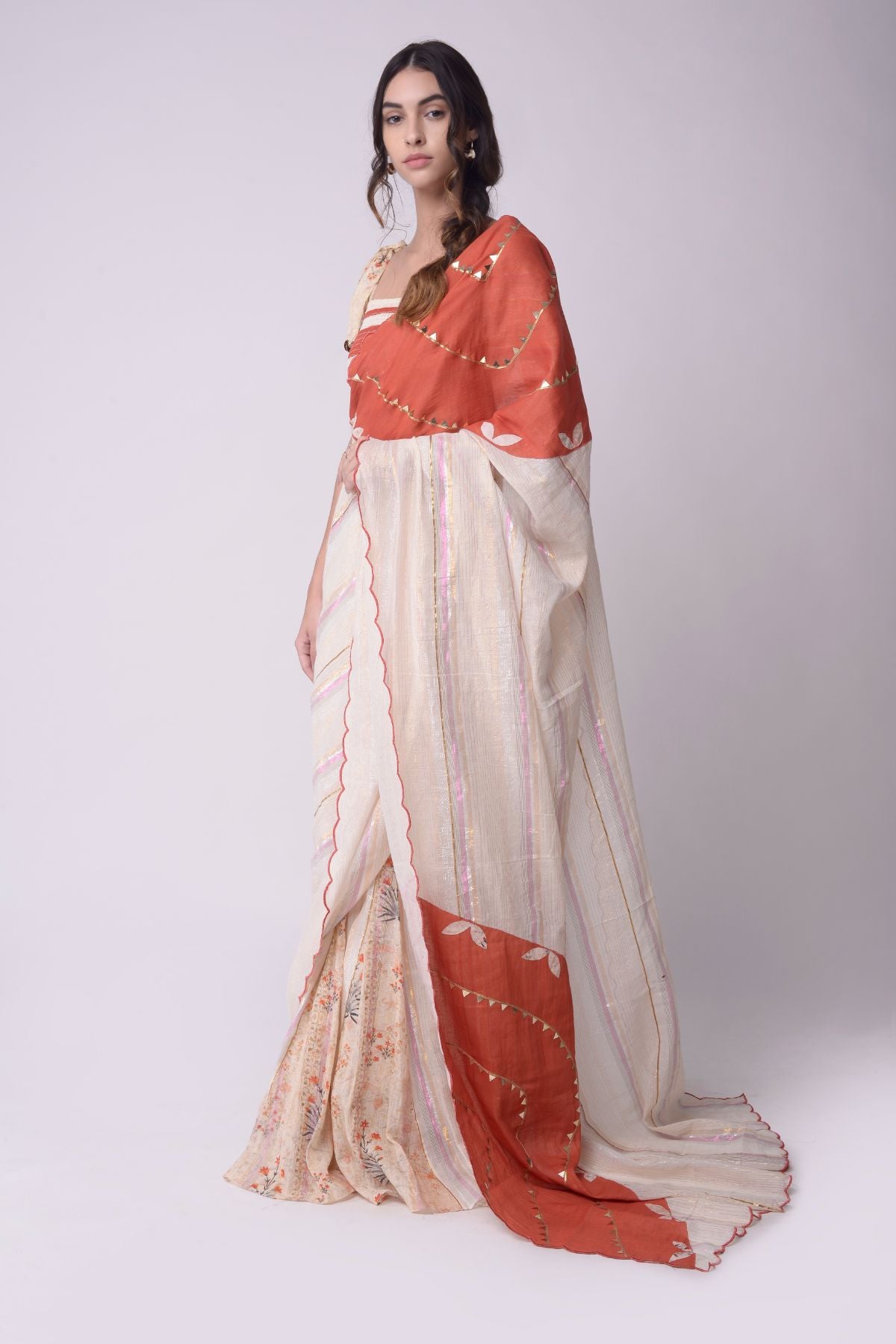 Appliqué Printed Godet Saree With Patchwork Smocking Crop Top.