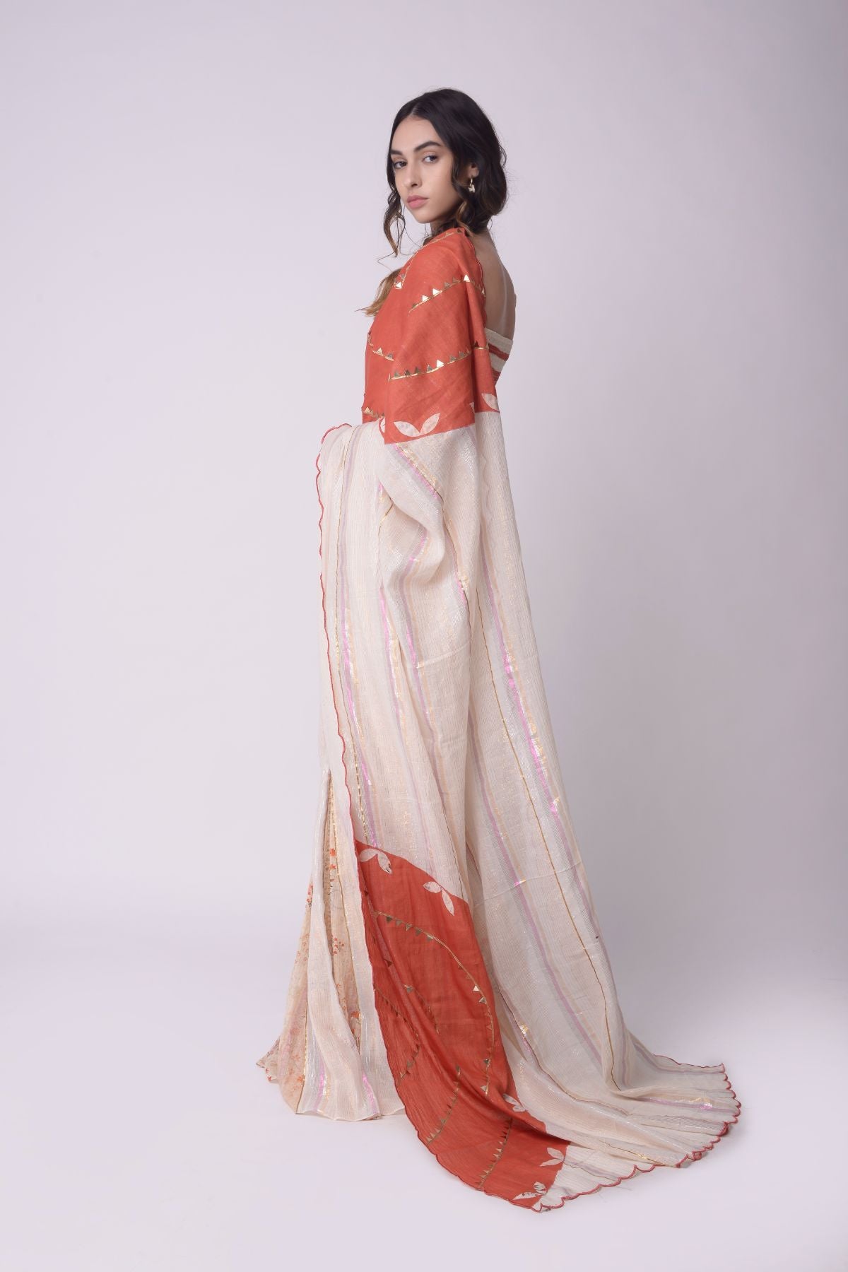 Appliqué Printed Godet Saree With Patchwork Smocking Crop Top.