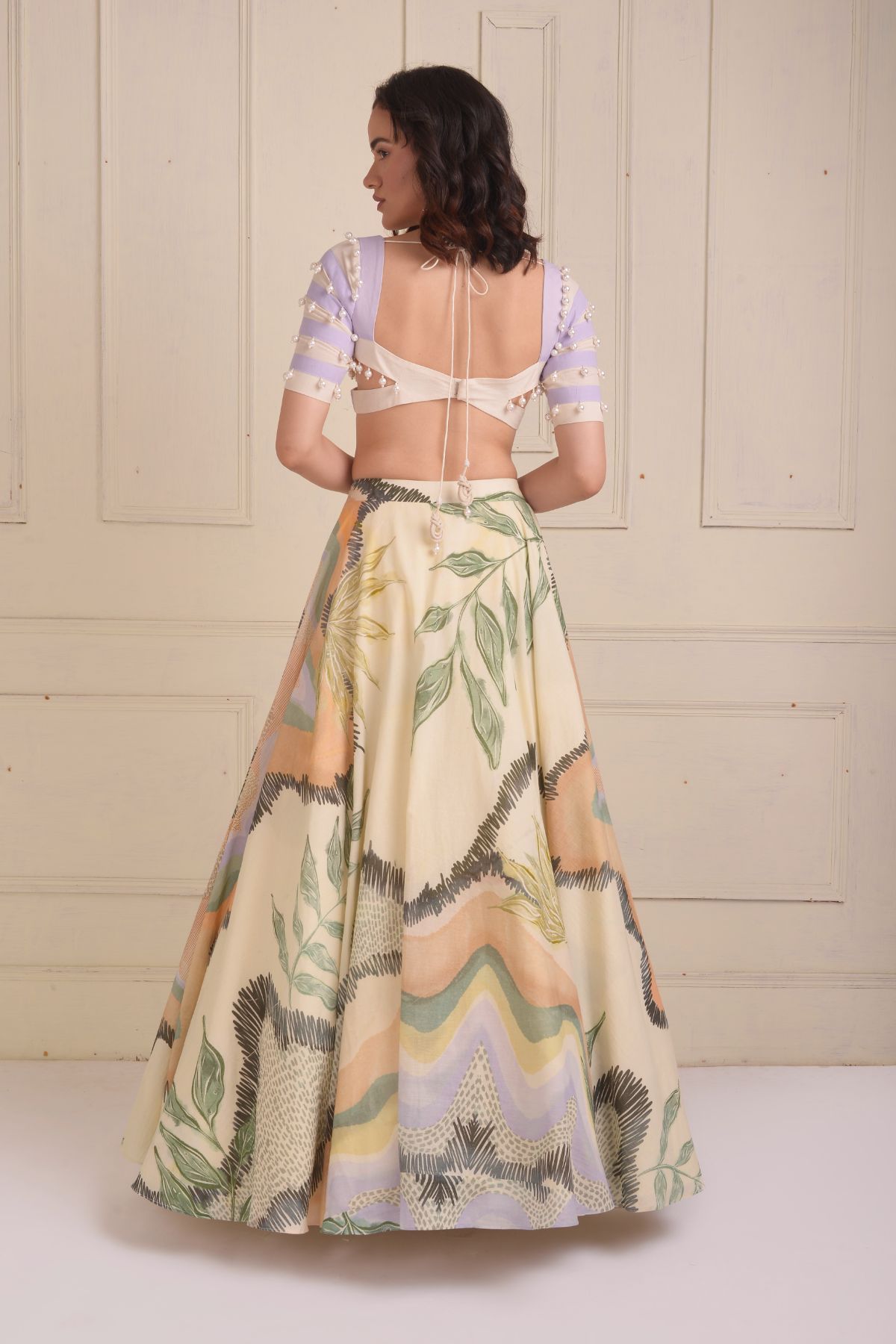 Printed lehenga with a patchwork beaded  blouse