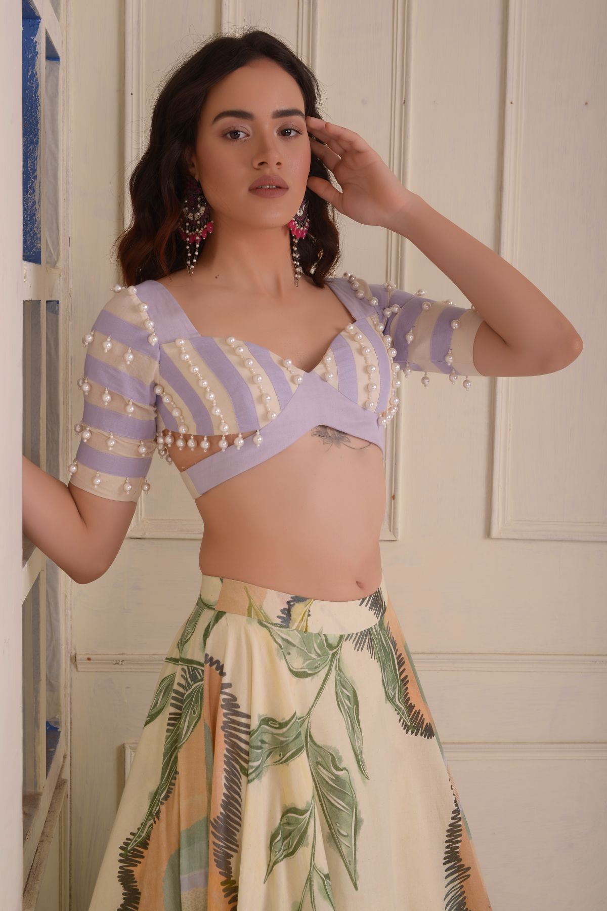 Printed lehenga with a patchwork beaded  blouse