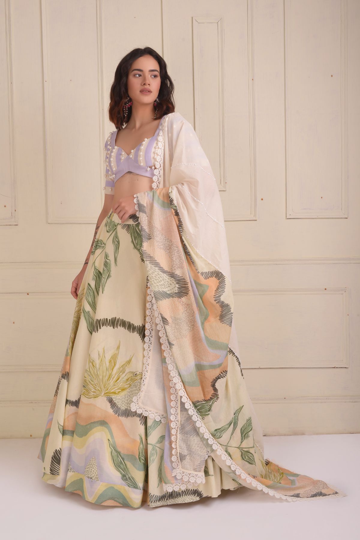 Printed lehenga with a patchwork beaded  blouse