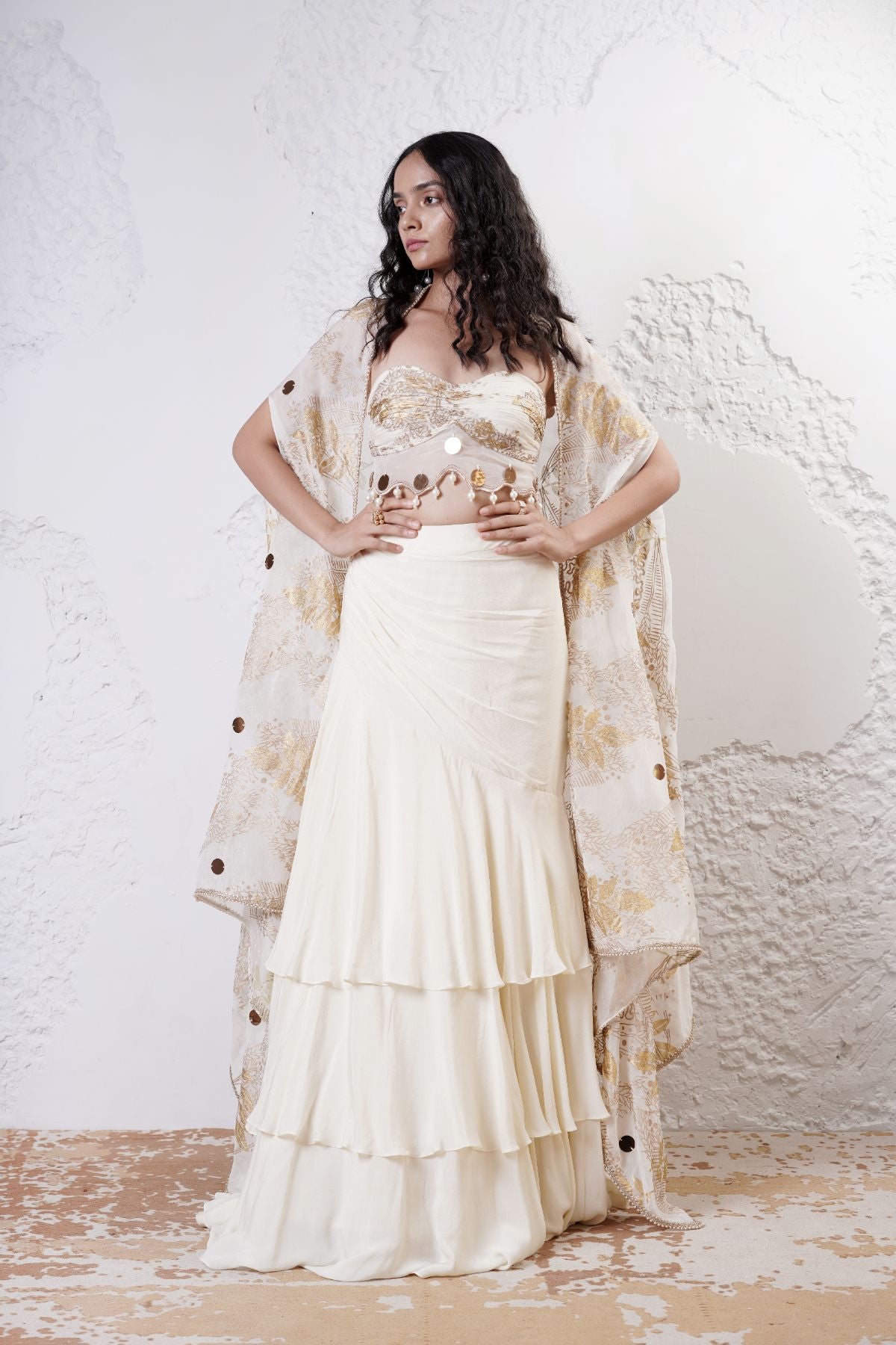 Layered Lehenga with Foil Ruvhed Bustier and Foil Cape