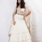 Layered Lehenga with Foil Ruvhed Bustier and Foil Cape