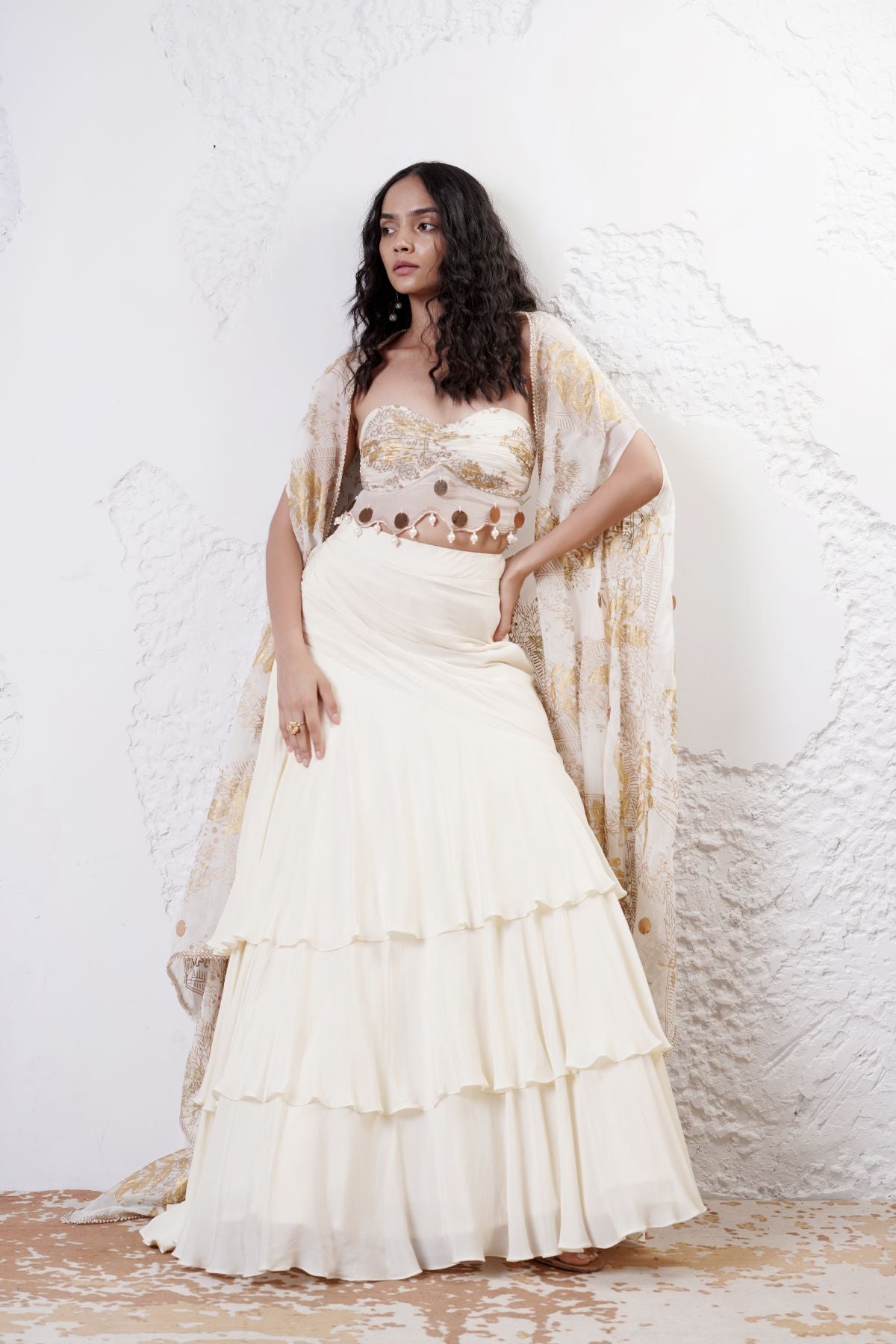 Layered Lehenga with Foil Ruvhed Bustier and Foil Cape