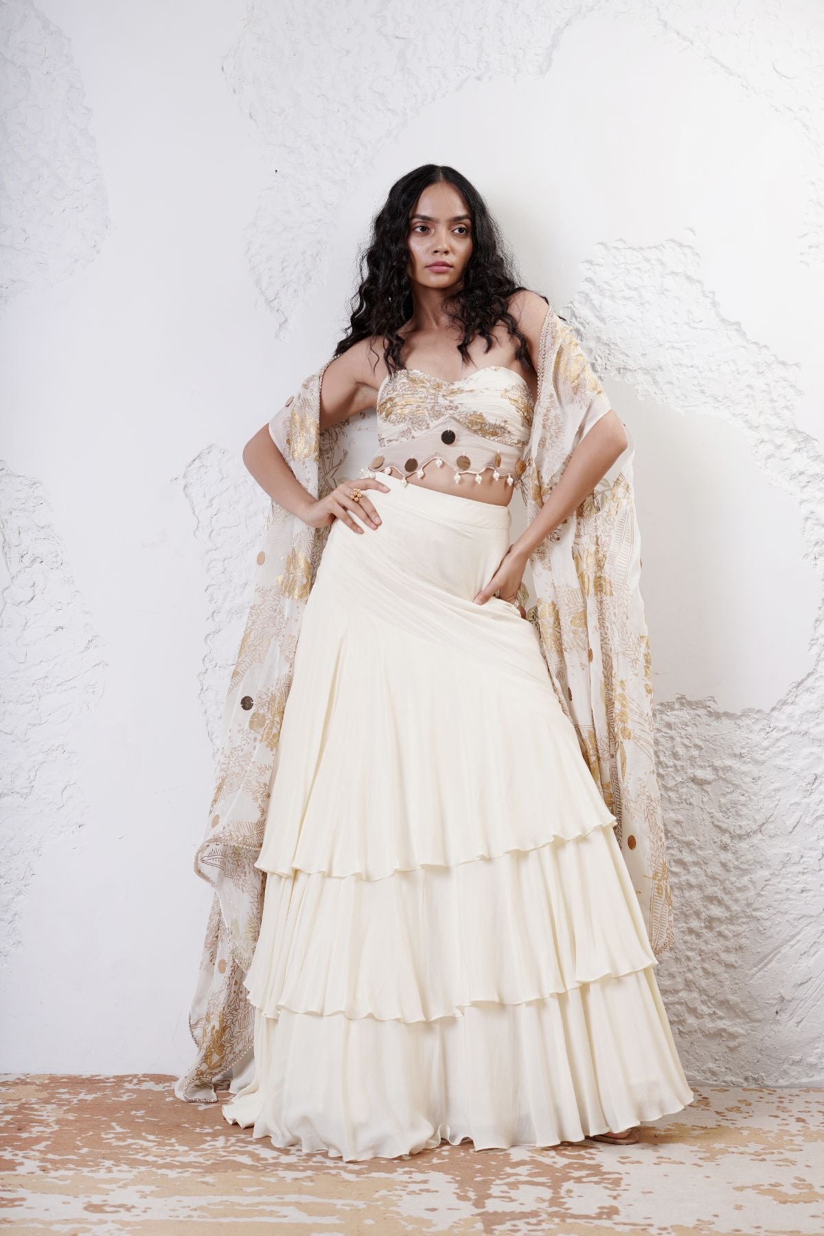 Layered Lehenga with Foil Ruvhed Bustier and Foil Cape