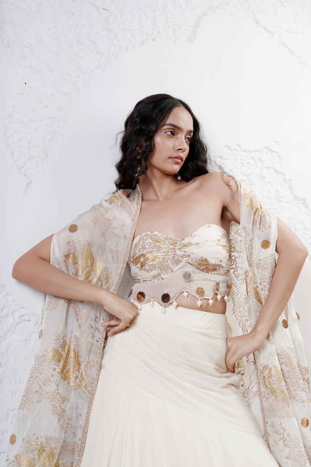 Layered Lehenga with Foil Ruvhed Bustier and Foil Cape