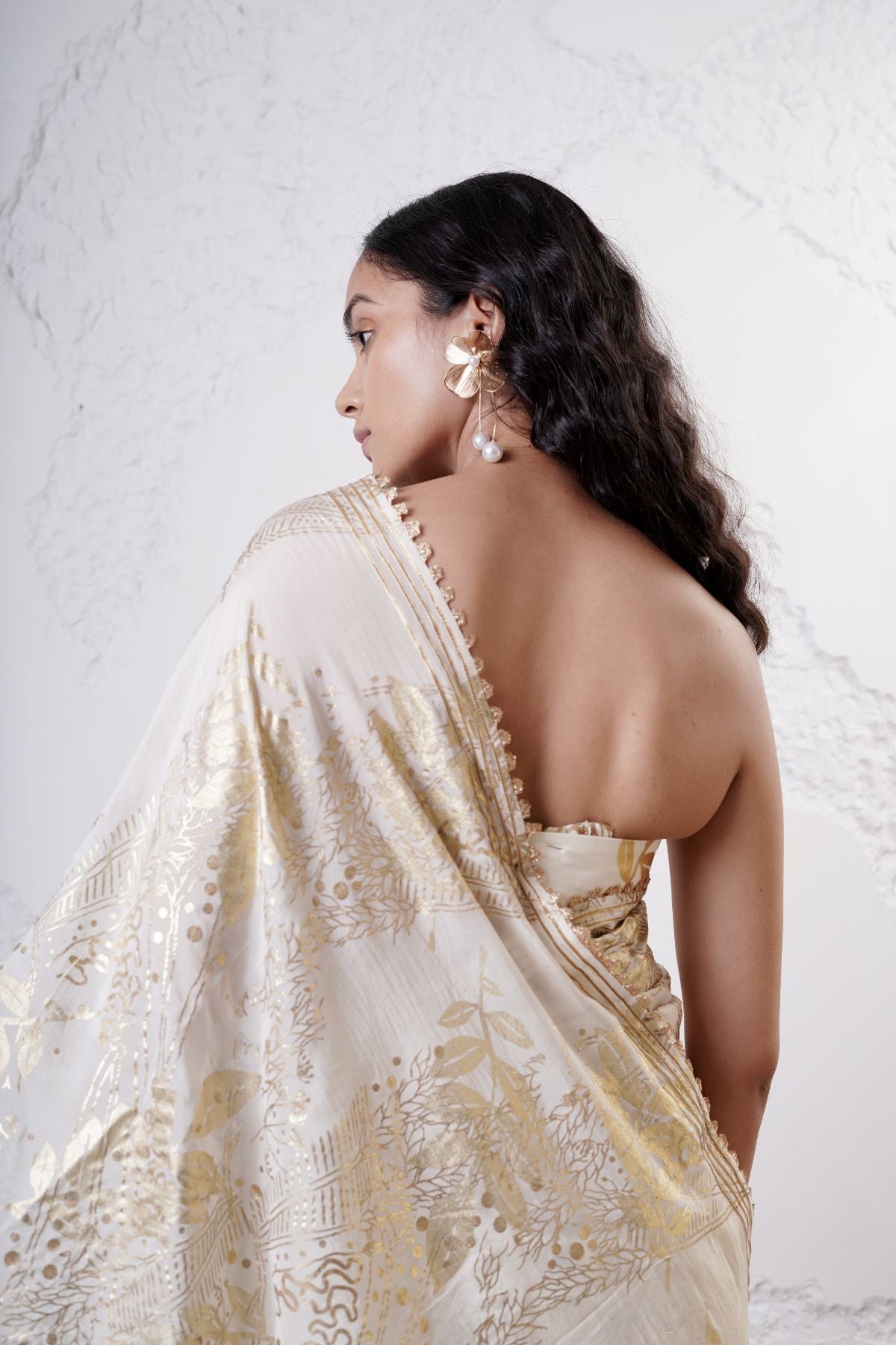 Foil Jaal Saree with Leaf Pleats Paired with a Ruched Bustier