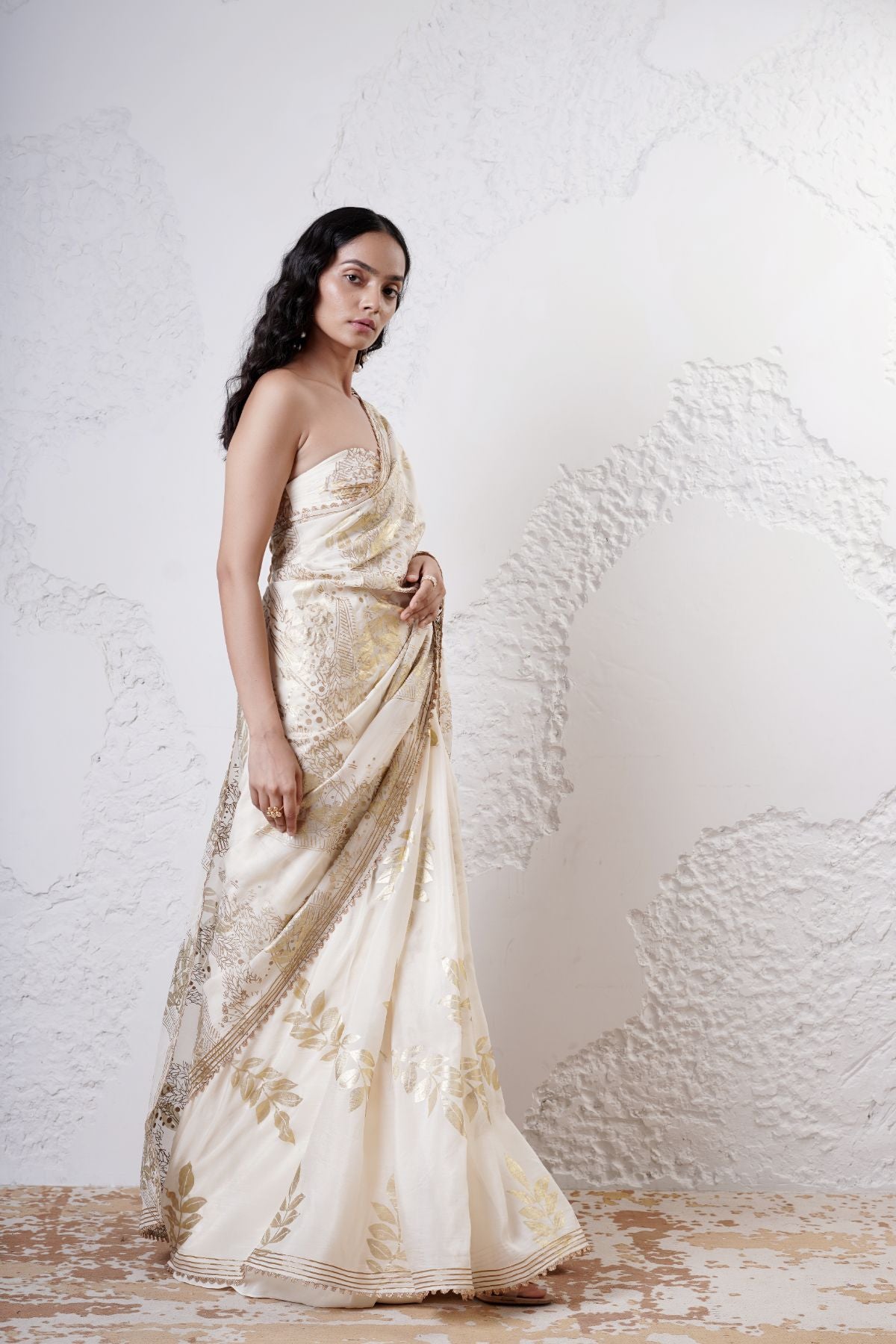 Foil Jaal Saree with Leaf Pleats Paired with a Ruched Bustier