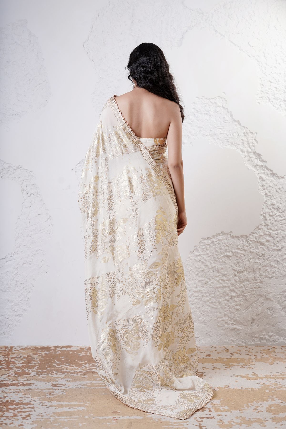 Foil Jaal Saree with Leaf Pleats Paired with a Ruched Bustier