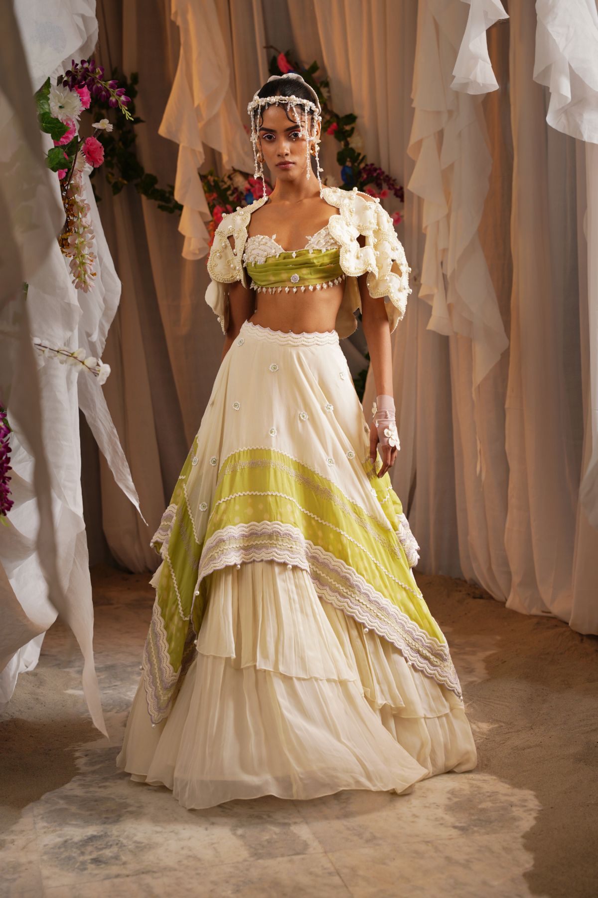 Scalloped Scarf Tier Lehenga With Draped Bustier And Floret Cutwork Cape