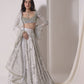 Foil twinkling lehenga with embroidered blouse and dupatta