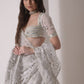 Circular tiered  lehenga with embroidered blouse and foil dupatta