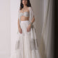 Ruched layered jacket with beaded foil bustier and sharara