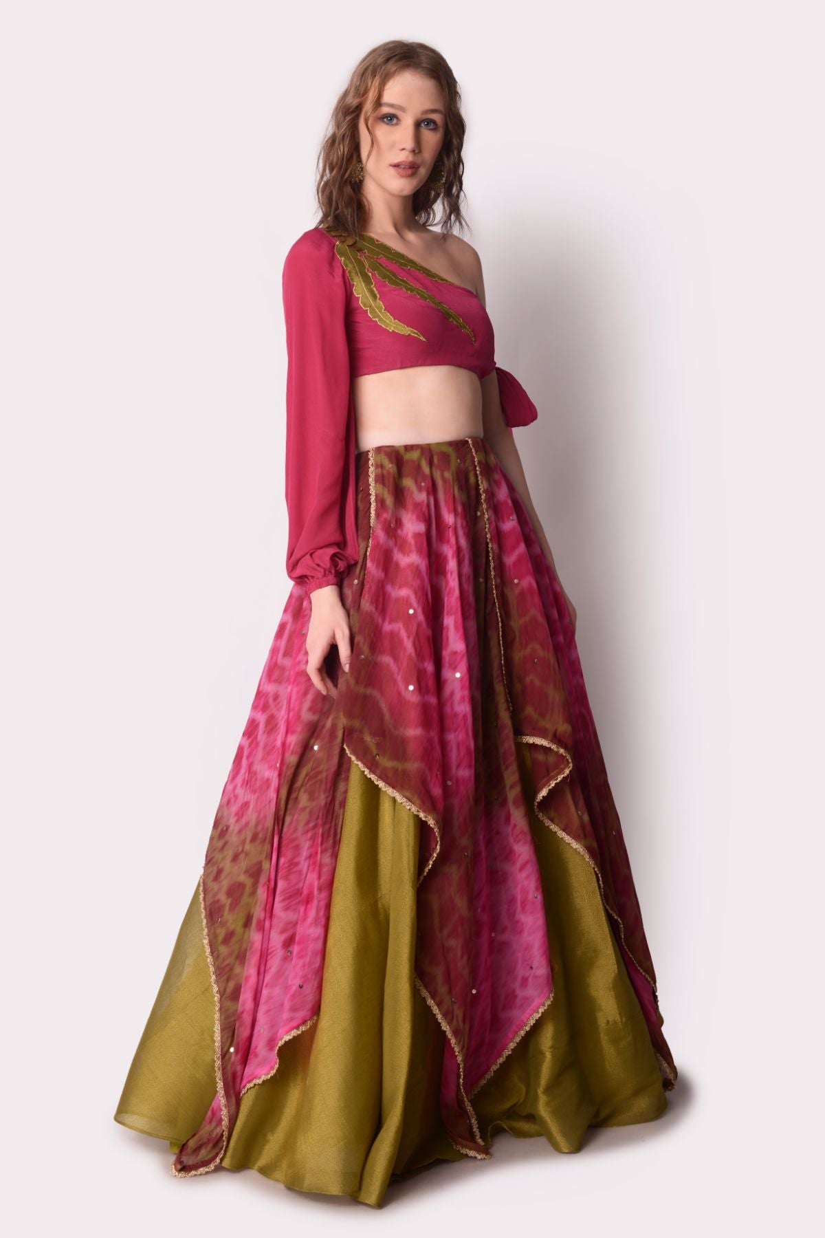 Tie –dye Layered Lehenga Paired With One Shoulder Tie Up Blouse