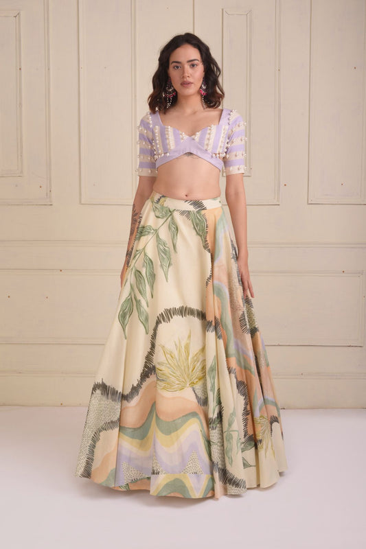 Printed lehenga with a patchwork beaded  blouse