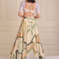 Printed lehenga with a patchwork beaded  blouse