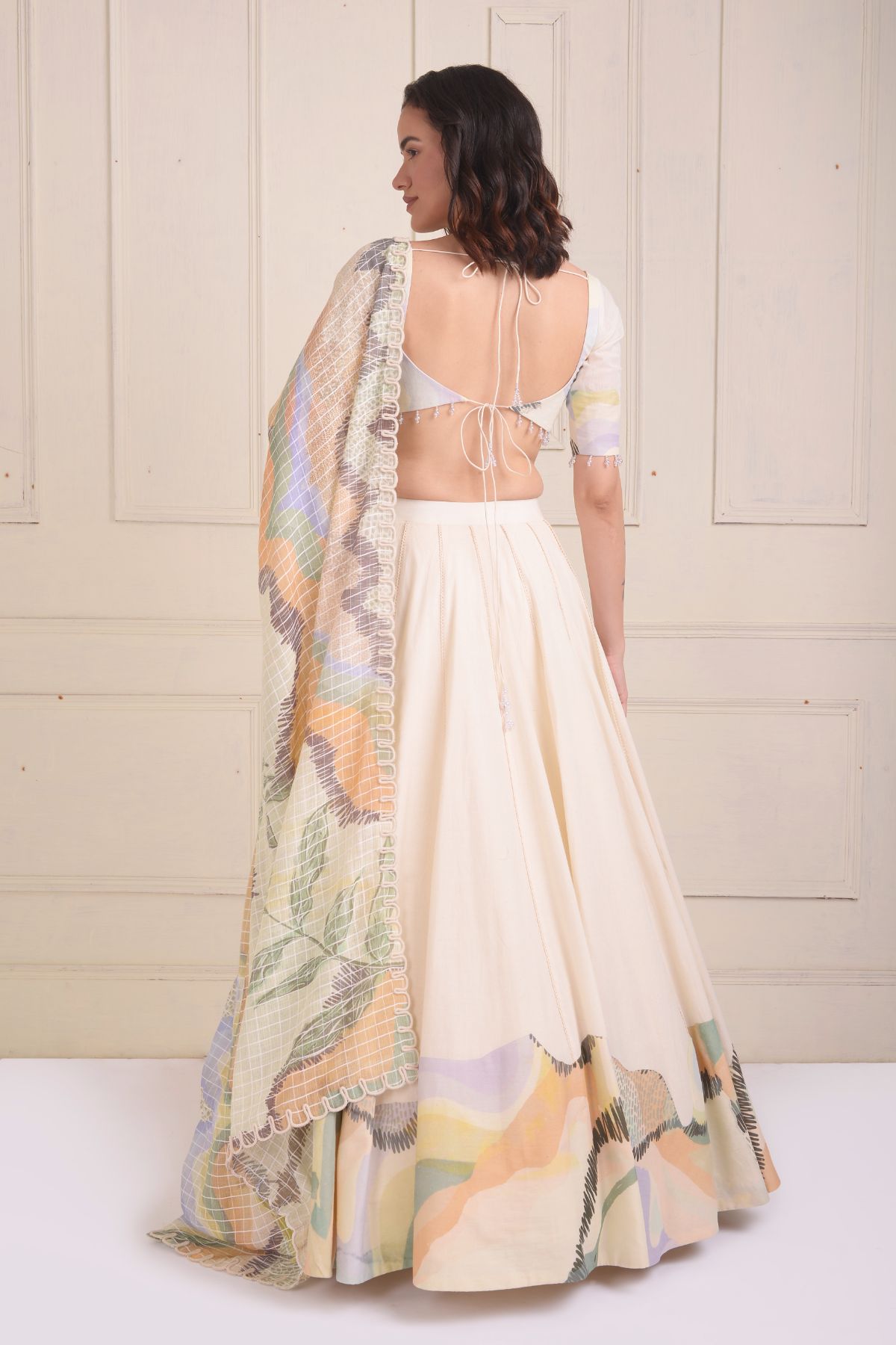 Placement patch printed lehenga with a printed scalloped neck blouse